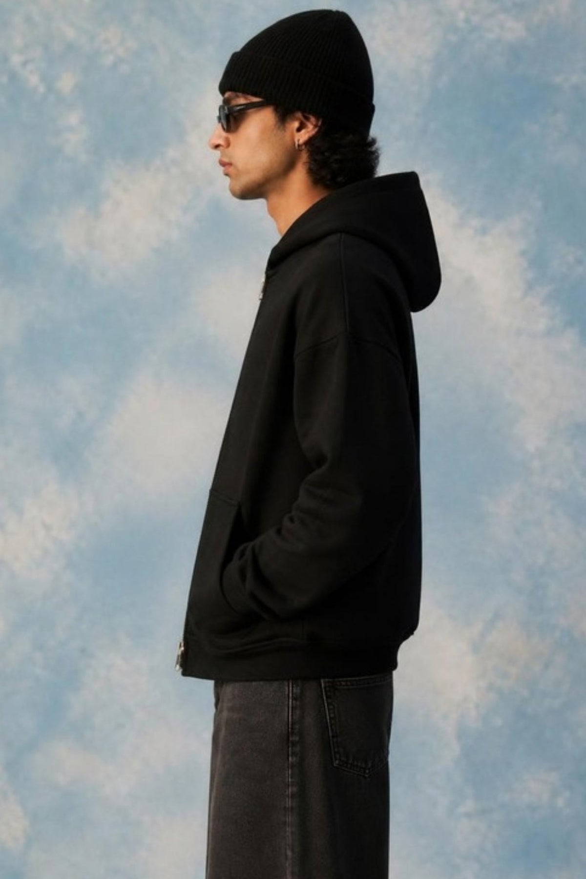 Side profile of the Sleepysleve Black Double Zip Hoodie