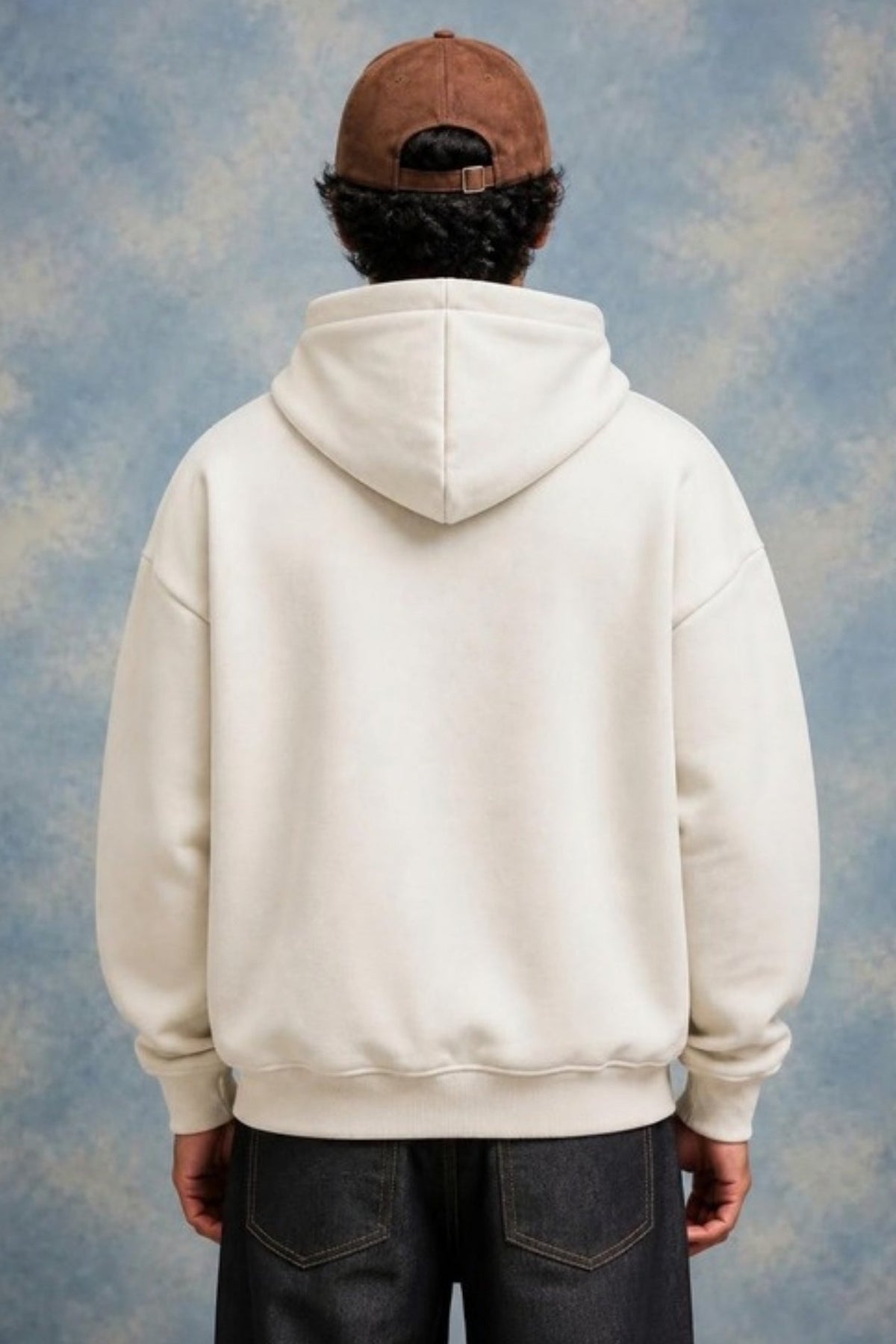 Back view of the Sleepysleve Cream Oversized Hoodie on a model