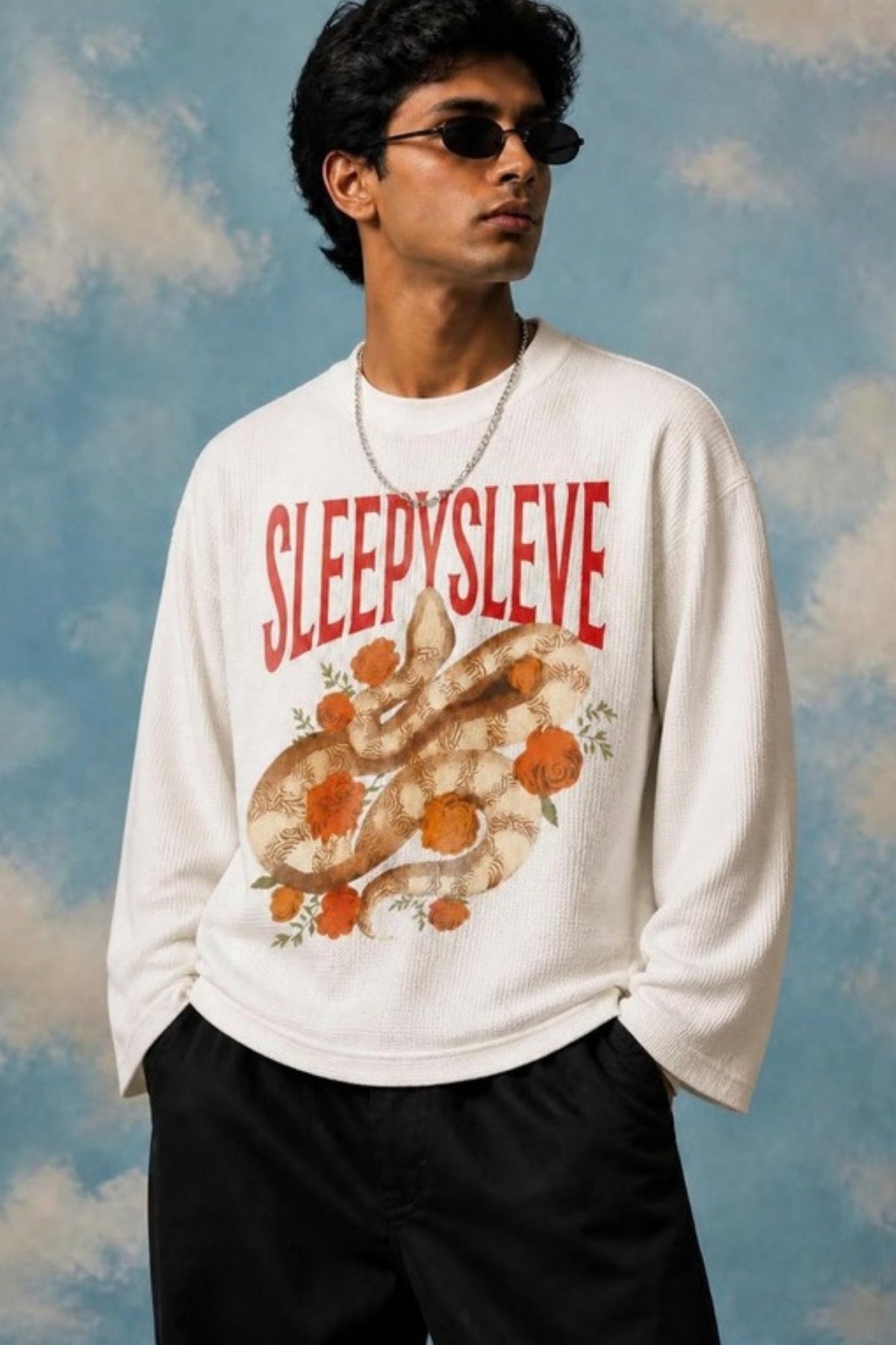 Model wearing the Sleepysleve Snakesleve waffle tee with open sleeves