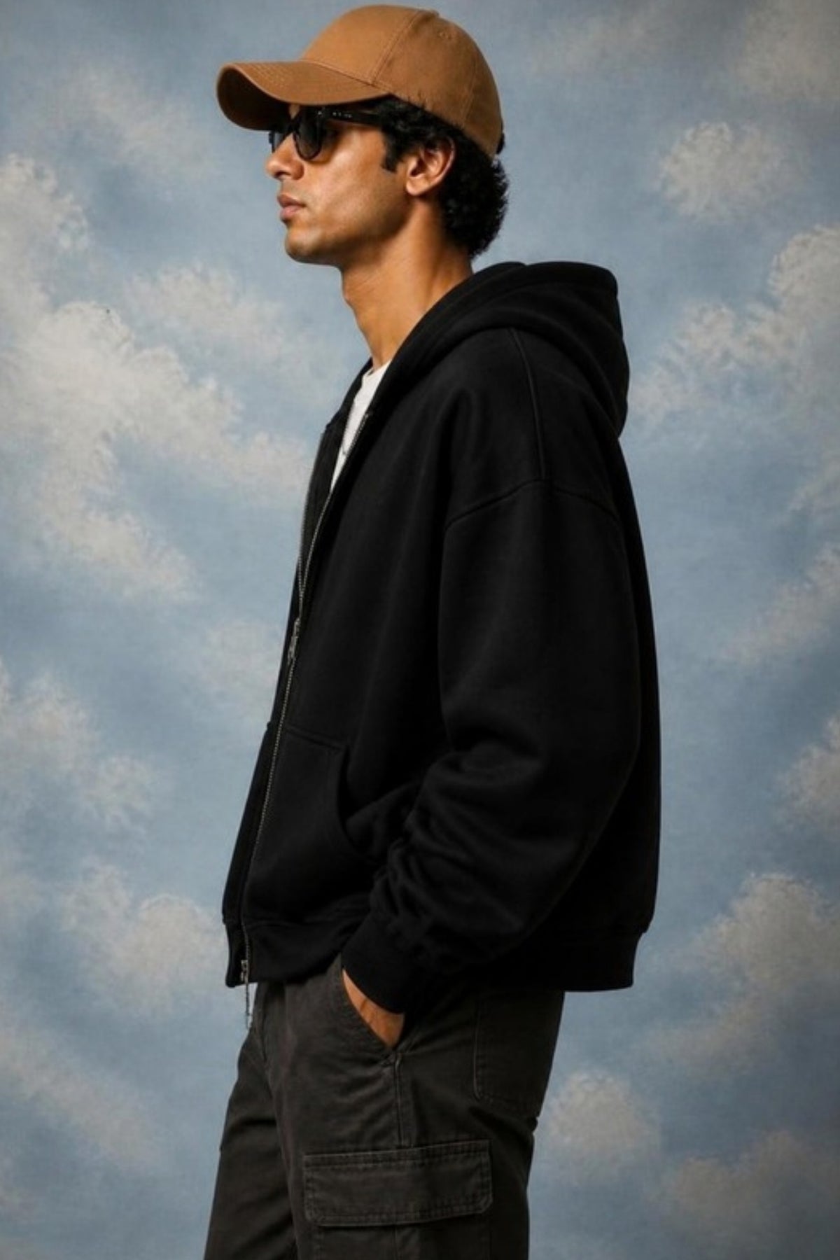 Side profile of the Sleepysleve Black Basic Double Zip Hoodie showing the boxy fit