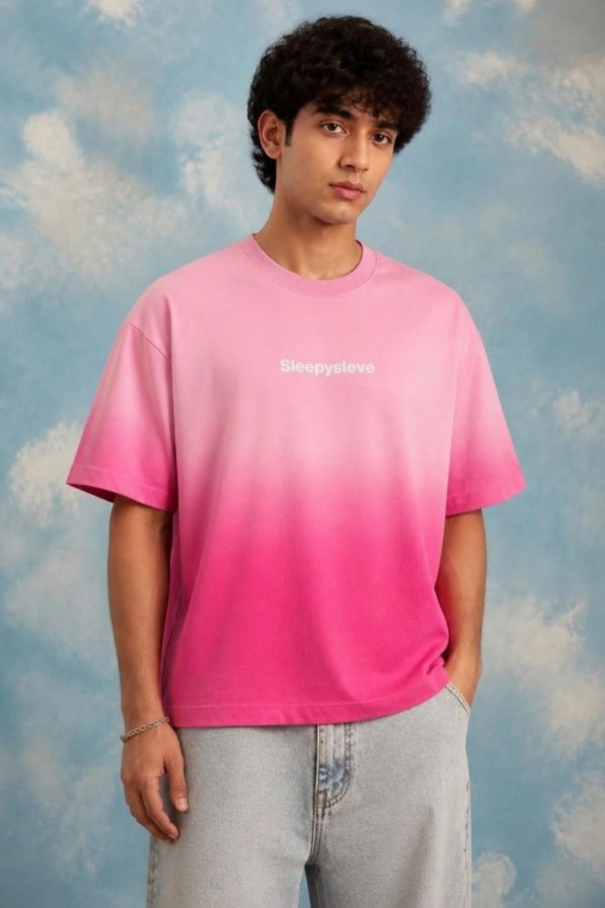 Front of the Sleepysleve Pyaar pink ombre wash boxy tee on a model