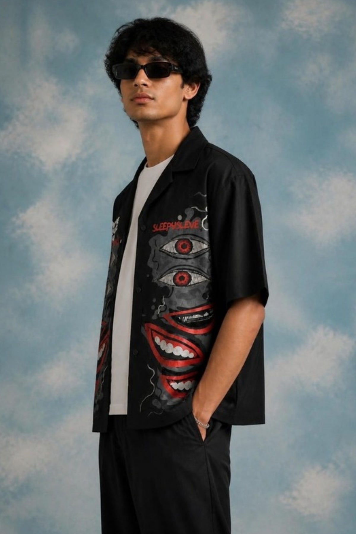 Side view of the Sleepysleve Redeye Box Fit Shirt showing the eyes artwork