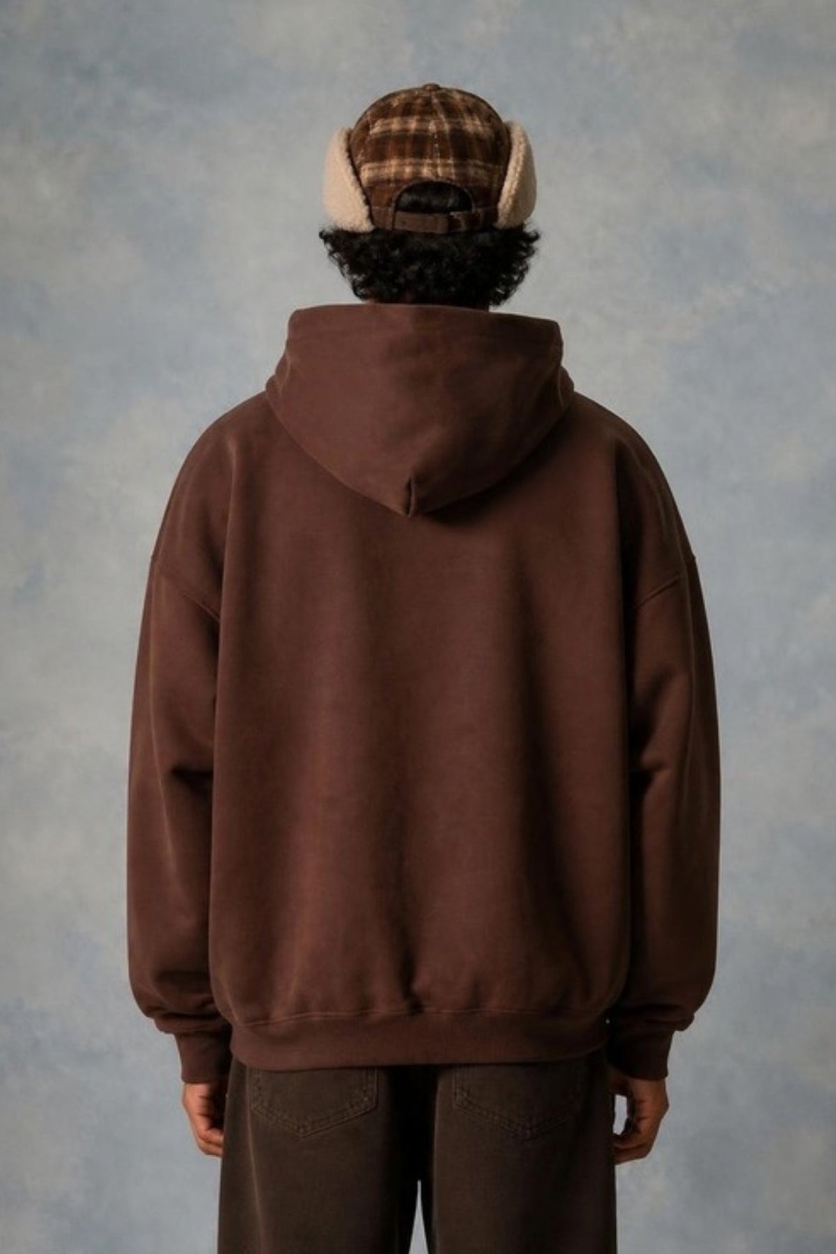 Back view of the Sleepysleve Chocolate Brown Oversized Hoodie on a model
