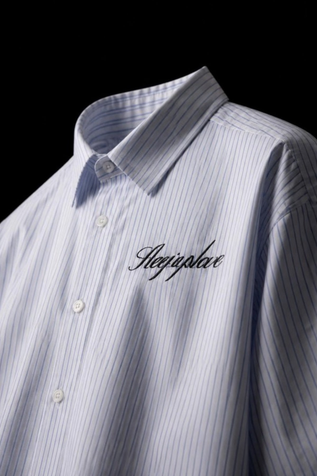 Close-up angle of the Sleepysleve Blue Striped Oxford Boxy Shirt chest and collar