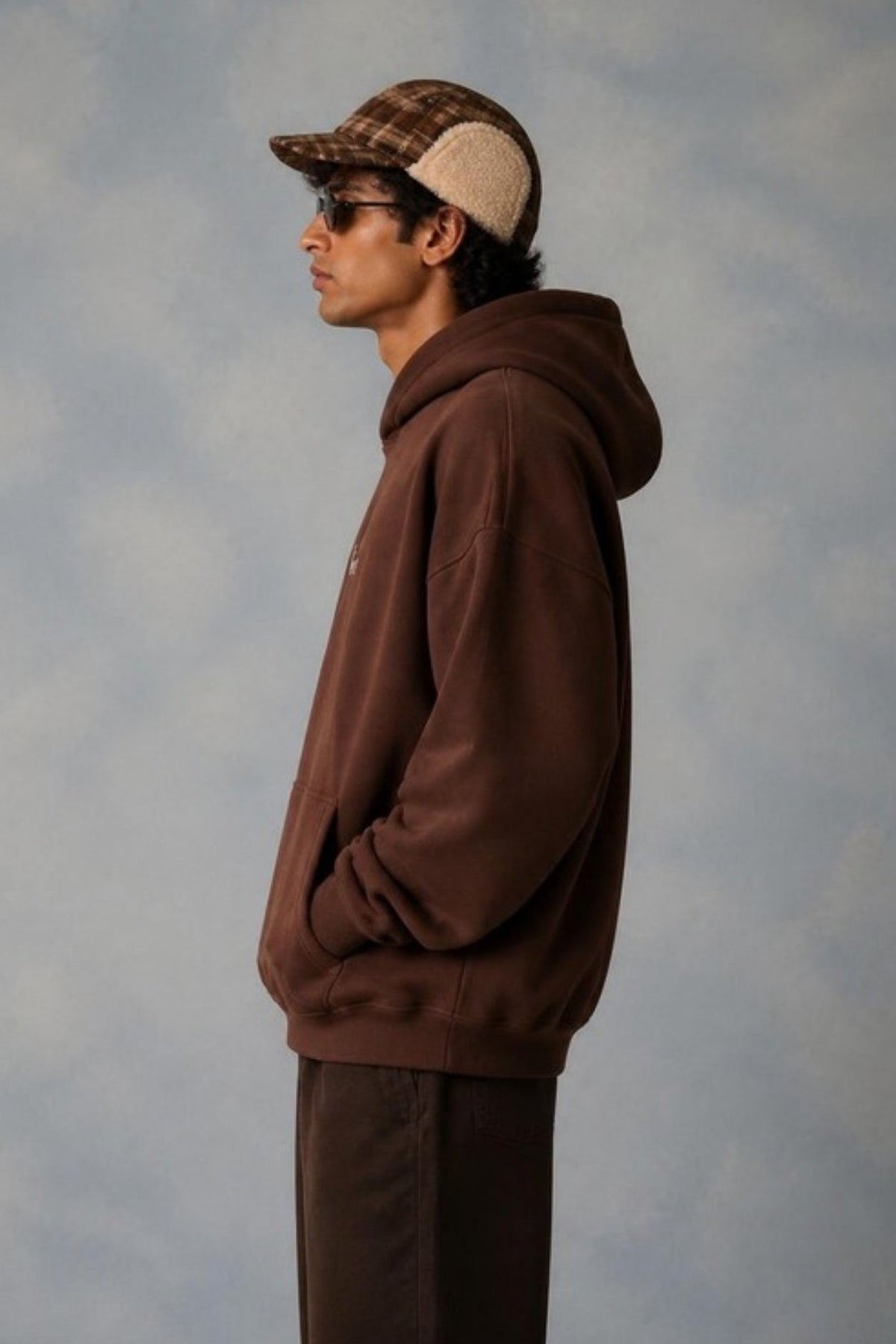 Side profile of the Sleepysleve Chocolate Brown Oversized Hoodie showing the boxy fit