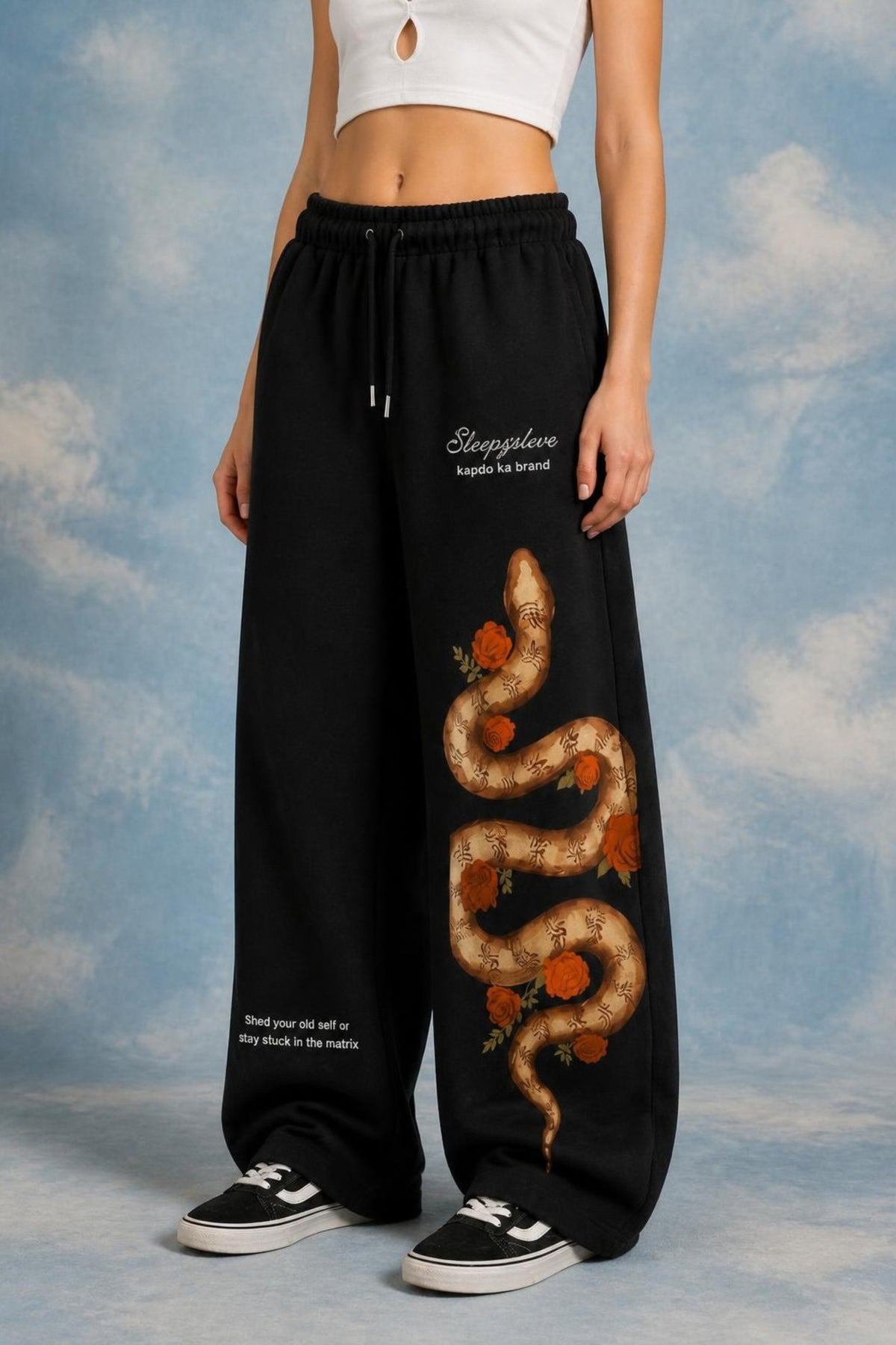 Sleepysleve Snakesleve sweatpant side view showing the snake and roses artwork