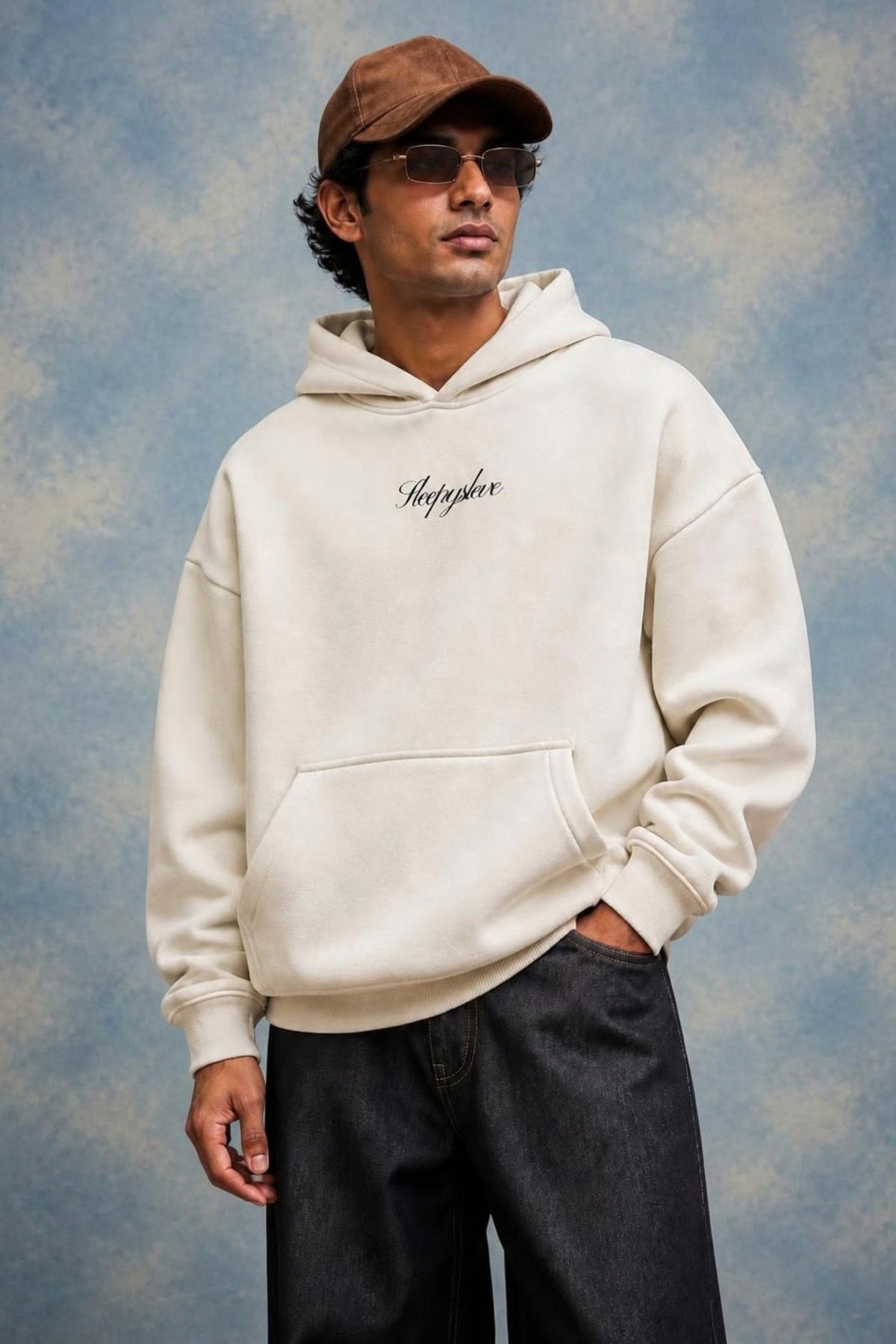 Model wearing the Sleepysleve Cream Oversized Hoodie