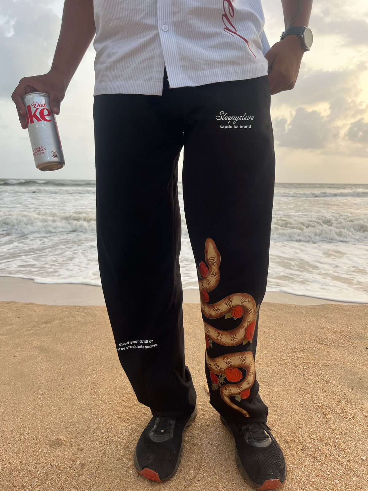 Sleepysleve Snakesleve sweatpant styled with a white tee